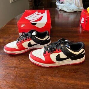 Nike Dunk Low Retro EMB Black, Red, and White. 75th Anniversary Chicago
